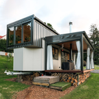 Casa contêiner moderna pré-fabricada e desmontável para moradia e escritório.